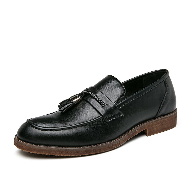 Mocassins en cuir avec pompons