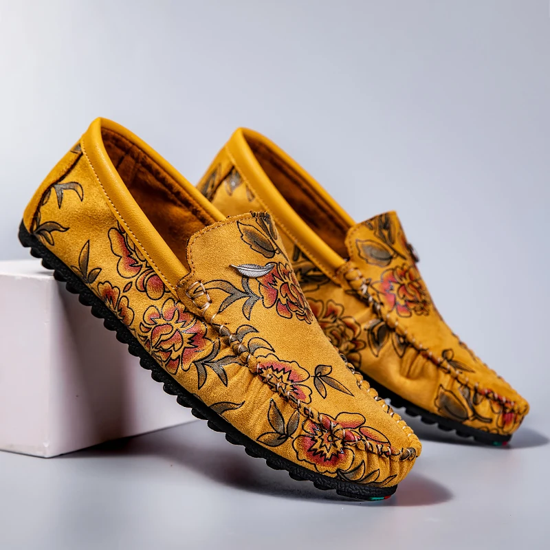 Loafers en cuir avec fleurs